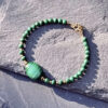 bracelet-malachite-verte-bienfaits-lithotherapie_1820 bracelet en pierre de malachite verte, bijou de lithothérapie aux vertus apaisantes et anti-douleur, parfait pour favoriser la confiance en soi et harmoniser les émotions.